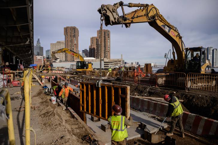 Construction work on a flood defense project on the east side of Manhattan, Dec. 12, 2021. A new report says funding remains mostly unused for the East Side Coastal Resiliency project.